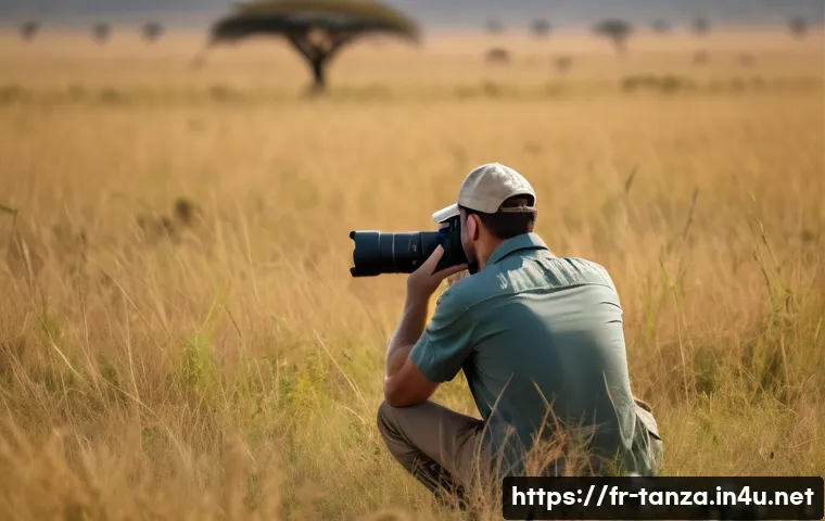 탄자니아에서 야생동물 사진 촬영법 - A professional wildlife photographer on safari in the Tanzanian savanna, using a DSLR camera with a ...